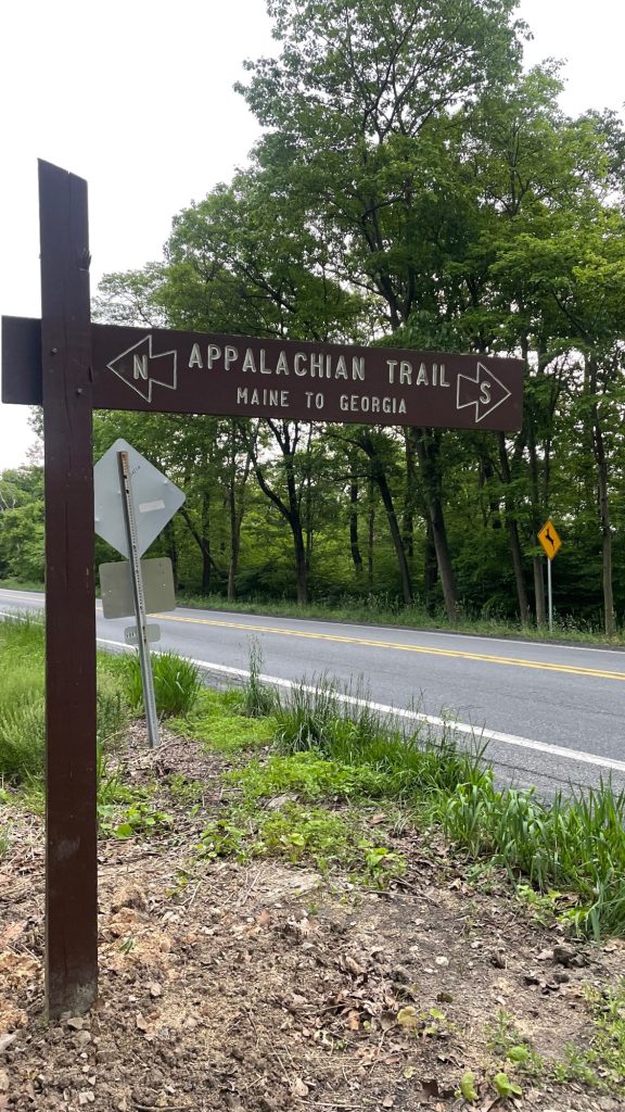 Appalachian Trail sign at Route 501 showing northbound toward Maine and southbound toward Georgia in Pennsylvania